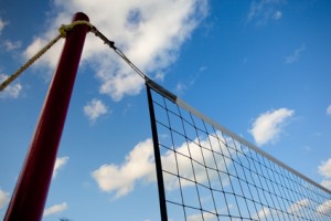 Net on beach and clouds